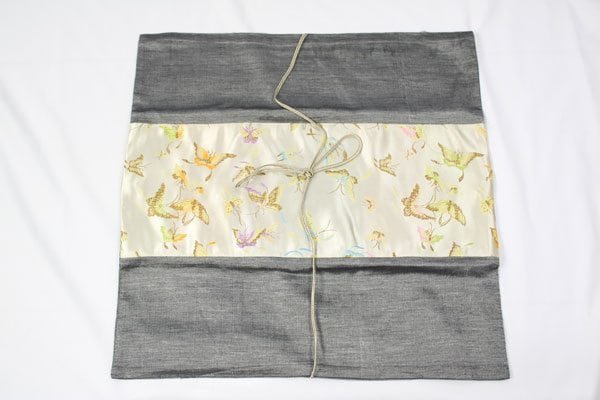 Thai cushion cover in dark gray color with butterfly pattern