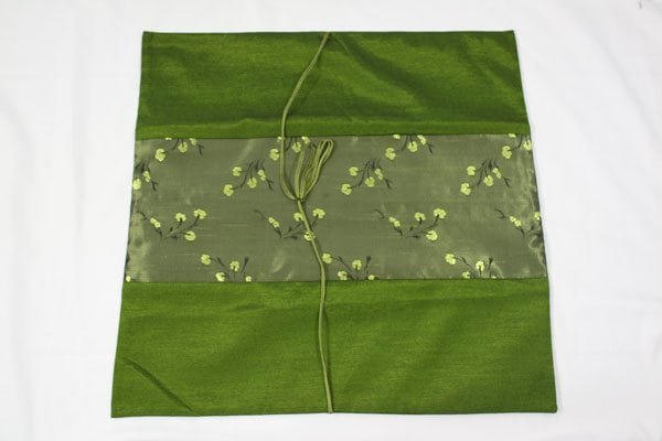 Thai cushion cover in green color with floral pattern