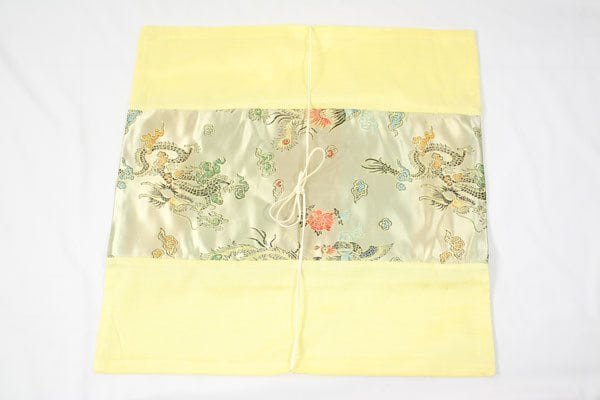 Thai cushion cover in beige color with dragon pattern