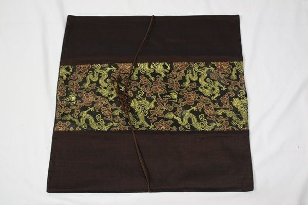Thai cushion cover in brown color with floral pattern