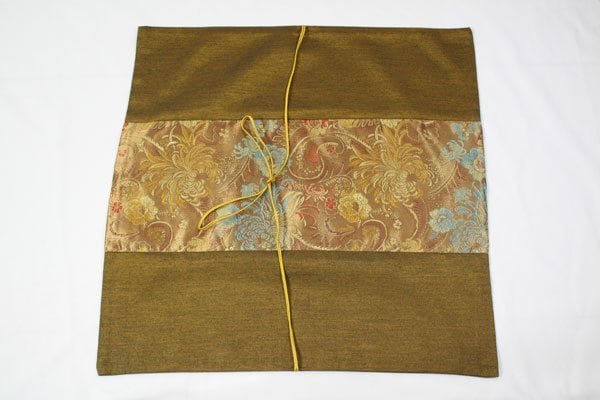 Thai pillow cover in golden color with floral pattern