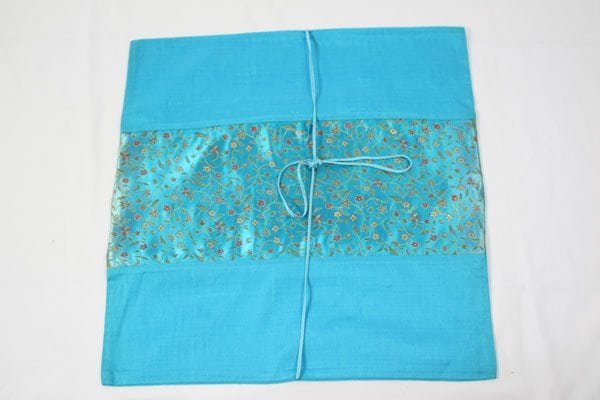 Thai cushion cover in aquamarine color with flower pattern